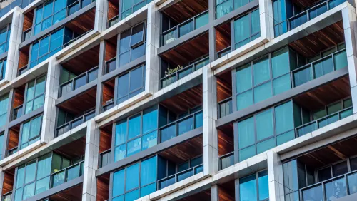 Modern apartment building with glass balconies