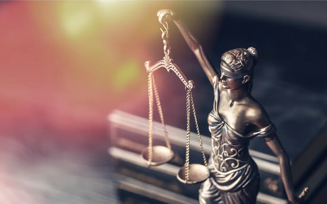 Statue of Lady Justice holding scales